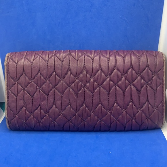 Authentic Miu Miu matelasse leather wallet